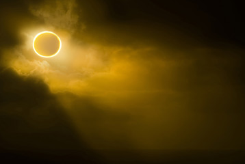 View of solar eclipse in sky during foggy weather