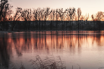 Winter lake at sunset
