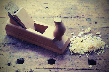 old wooden plane on the table