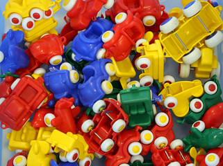 Fototapeta premium many colorful plastic toy cars