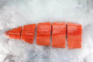 Fresh raw salmon fillet on ice
