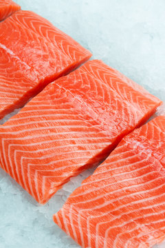 Fresh raw salmon fillet on ice