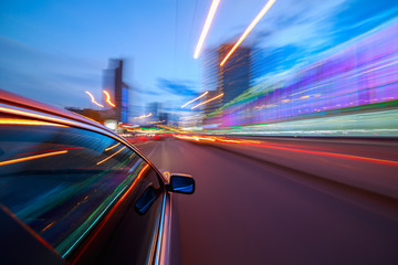 Blurred urban look of the car movement in a city street at nights. Longexposure shot.