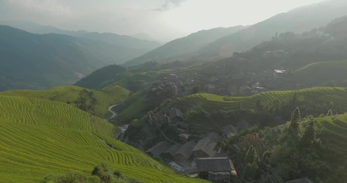 Aerial view of beautiful The Longji Rice Terraces located next to the village of Ping'an in China. UNESCO World Heritage. Freedom, travel destination, power of nature concept.