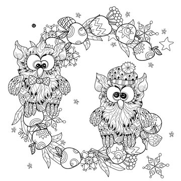 Small Owls on tree branch - hand drawn doodle vector