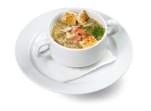 cream soup with croutons isolated on the white background