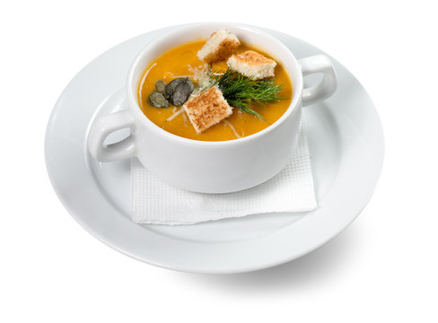 cream soup with croutons isolated on the white background