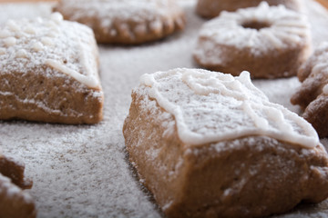 Gingerbread cookies on plate covered with sugar