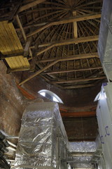 Area under a wooden dome with equipment for heat exchange