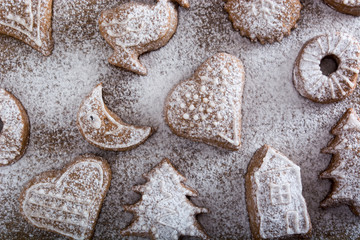 Gingerbread cookies on plate covered with sugar