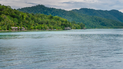 Homestay on Kri Island, Monsuar in Background, Raja Ampat, Indonesia, West Papua