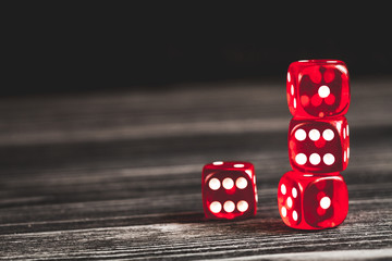 concept luck - dice gambling on dark wooden background