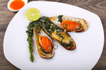 Baked mussels with spinach
