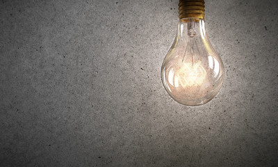 Electric bulb on texture . Mixed media