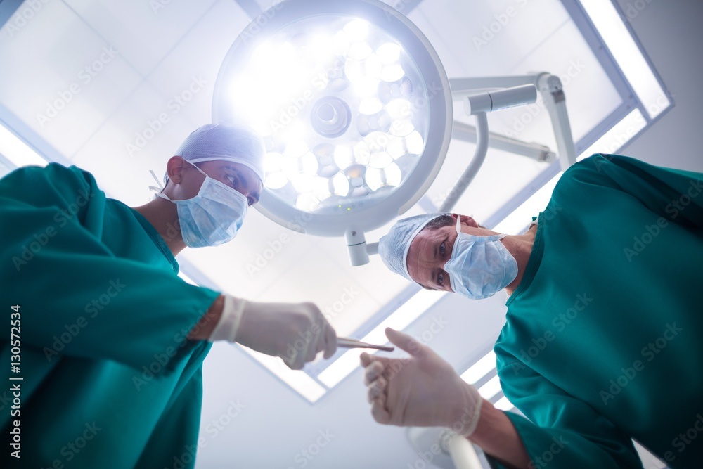 Poster surgeons operating in operation theater