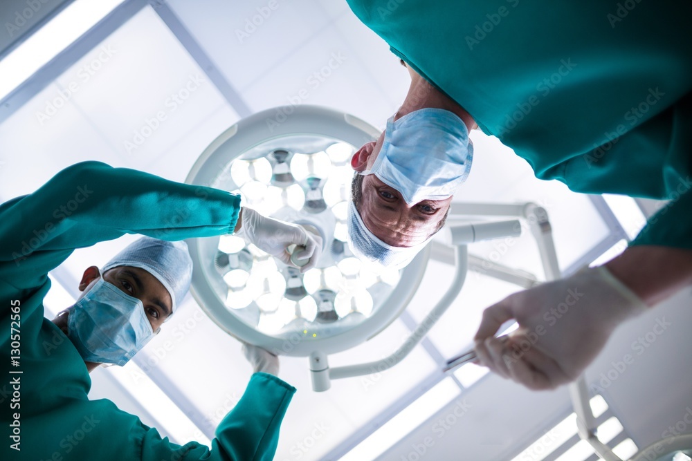 Poster surgeons operating in operation theater