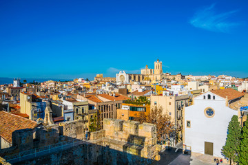 Aerial view of tarragona taken from the circo romano with the cathedral of saint mary on background - obrazy, fototapety, plakaty