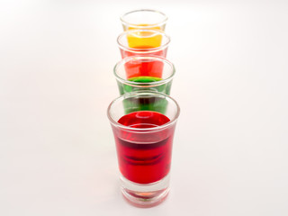 Colored glass on white background.