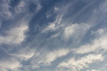 blue sky with tiny clouds