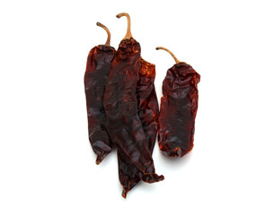 dried chili peppers isolated on a white background