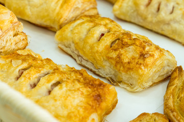 Selection of Pies, on white stencil paper background.