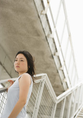 Woman standing on stairs