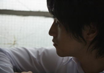 Side view of young man