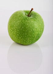 One wet green apple