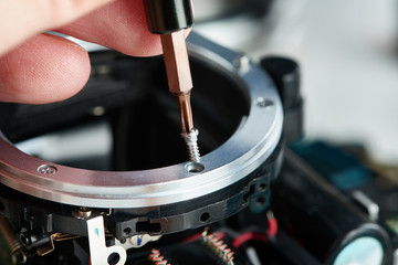 Repair broken DSLR camera in service center