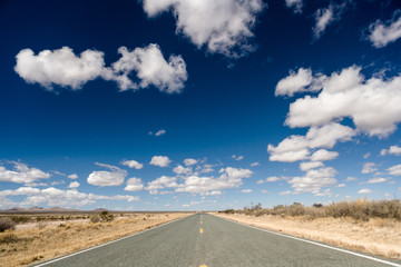 Road and clouds in the sky