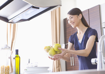 Obraz premium A woman in a kitchen