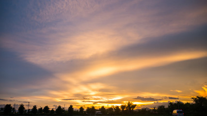 Sunset or sunrise with cloud and ray light on blue sky