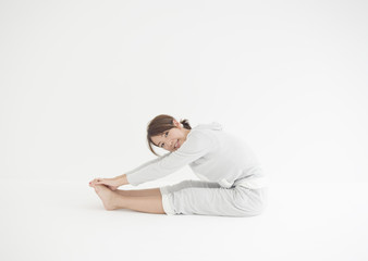 Young woman stretching