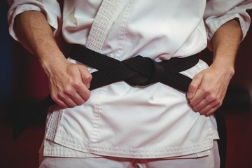 Karate player in black belt © WavebreakmediaMicro