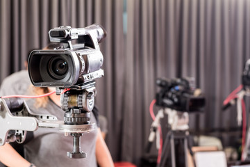 Fototapeta na wymiar digital video camera with lens equipment in professional media s
