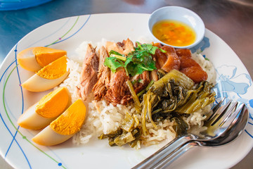 Stewed pork leg on rice,Thai food.