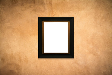 wooden picture frame on  old wall background