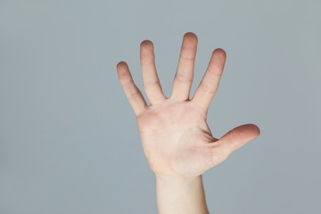 Hand of a woman touching an invisible screen