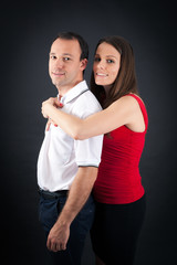 Beautiful couple doing different expressions in different sets of clothes: arms crosed