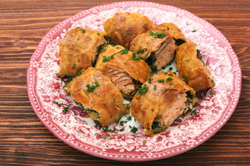 Salmon fillet and spinach with cheese baked in puff pastry