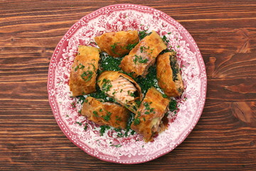 Salmon fillet and spinach with cheese baked in puff pastry
