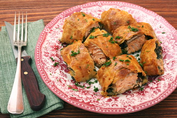 Salmon fillet and spinach with cheese baked in puff pastry