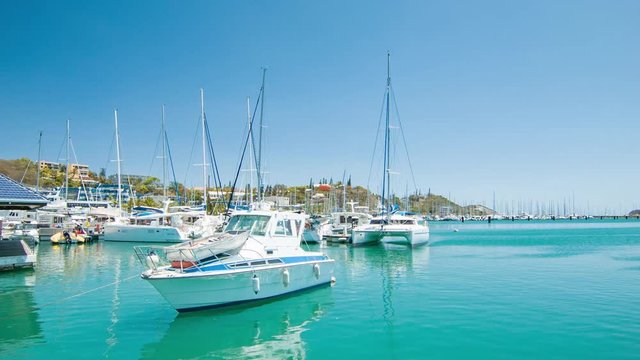 Generic Unmarked Boats and Yachts in Nouméa New Caledonia Tropical Port Moselle Marina with Exotic Turquoise Blue Water