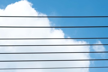 Cable Electric with cloud and blue sky background.