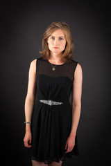 Beautiful woman doing different expressions in different sets of clothes: angry