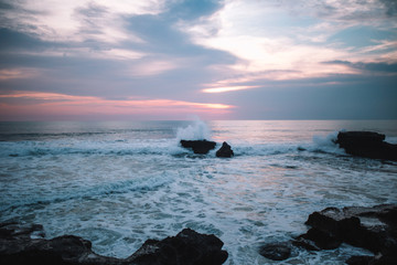 Rocky shore during sunset on the ocean, Indonesia,Bali - Powered by Adobe