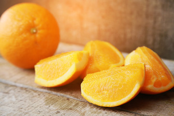Fresh orange on wooden background for healthy. Organic or clean fruit from orchard in the market. Clean fruit and drink for healthy and diet. Low sugar fruit for diet and feeling fresh when drinking.