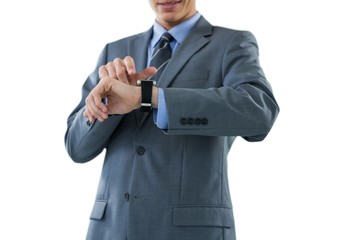 Businessman checking his smart watch