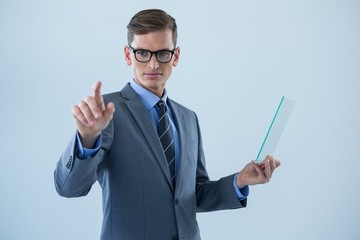 Businessman pretending touch invisible screen