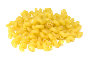 Cellentani pasta pile, isolated on white background